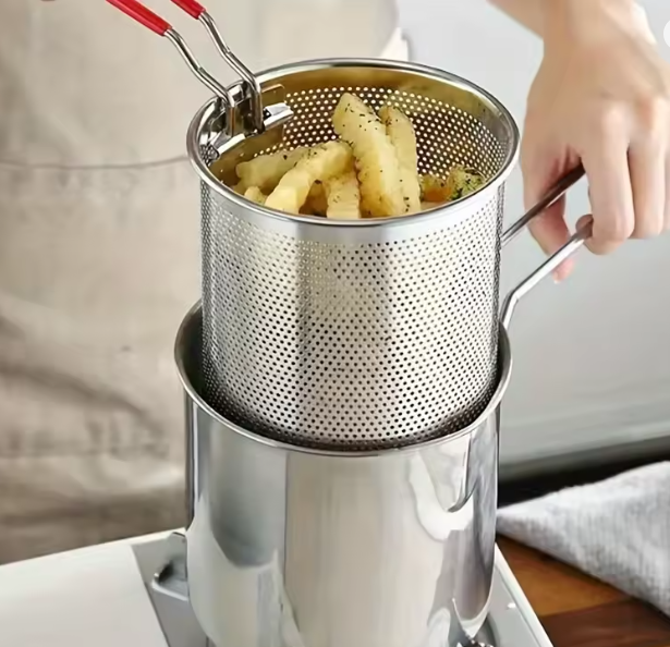 Compact stainless steel deep fryer with filter rack simplifies home cooking to make the perfect crispy chips for french fries