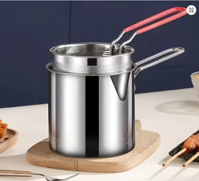 Compact stainless steel deep fryer with filter rack simplifies home cooking to make the perfect crispy chips for french fries